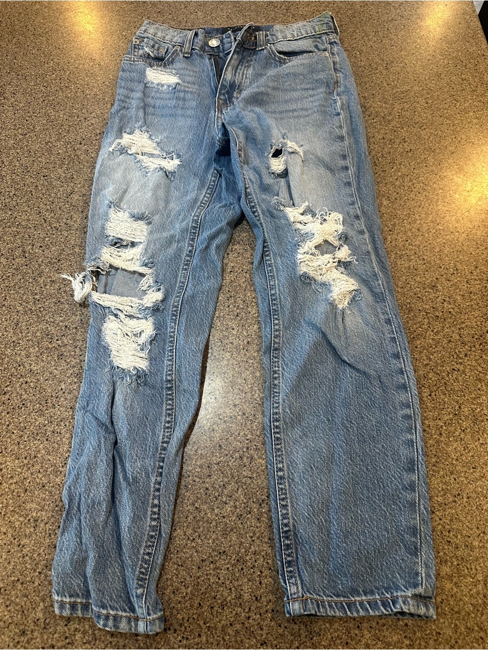 Distressed Light Blue Jeans - Classic Ripped Denim